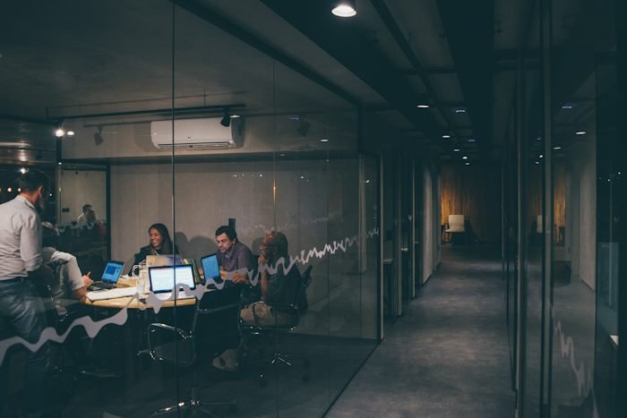 People discussing a project around a table